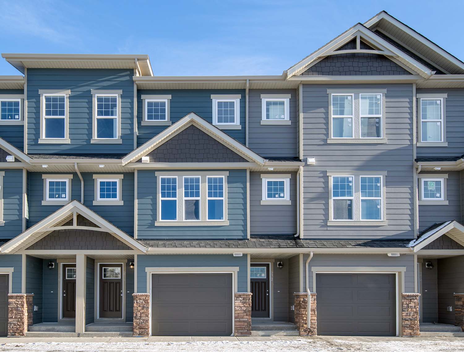 ZEN Riverstone townhomes with attached single garages