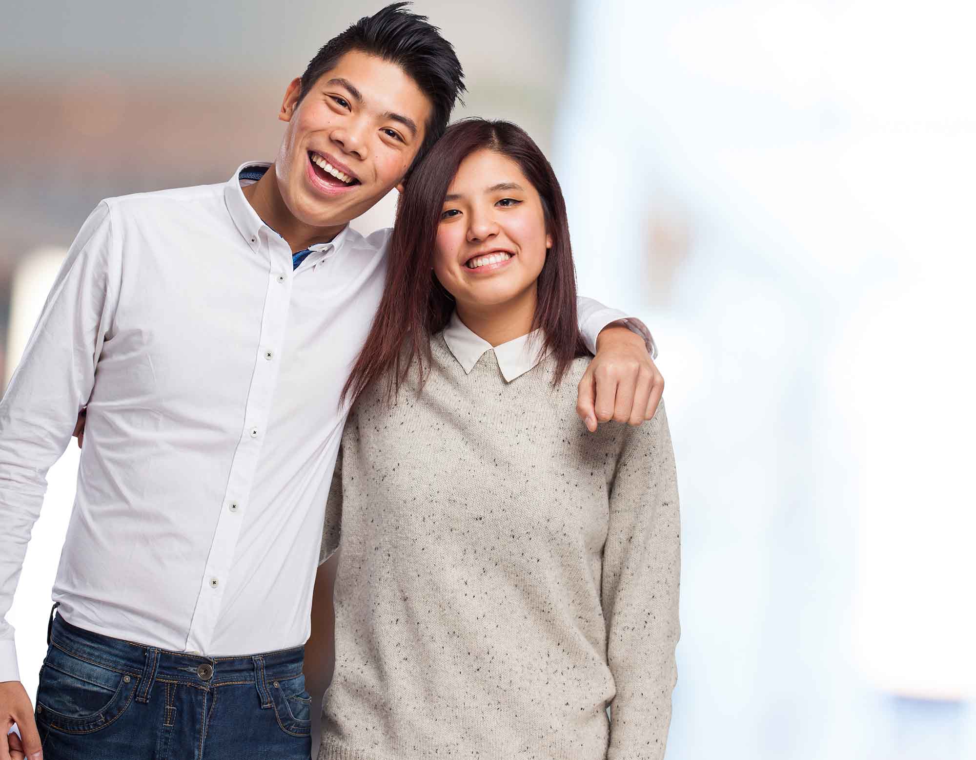 Smiling young couple in a comfortable, sustainable home