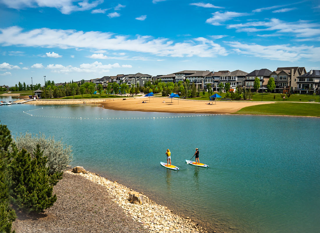 Lake Mahogany with beach and clubhouse in the background.